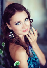 young beautiful girl walks in the park