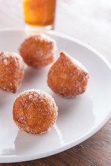 Fritter puff dusted with sugar