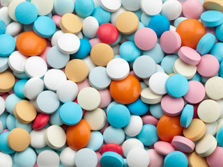 Many multi-coloured pills.