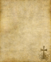 christian cross on old paper or parchment background texture
