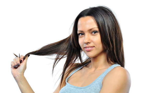 Happy young woman touch hair