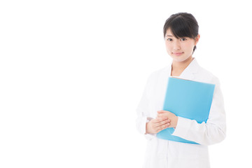 a young asian doctor on white background