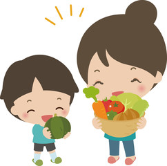 たくさんの野菜を持った男の子と母親