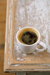 espresso coffee and almonds on old rustic table