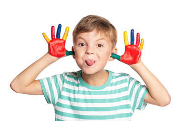 Little boy with paints on hands