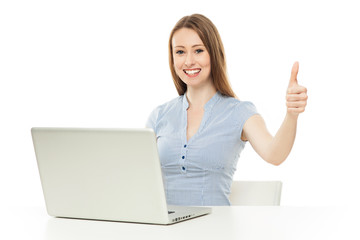 Woman with laptop showing thumbs up