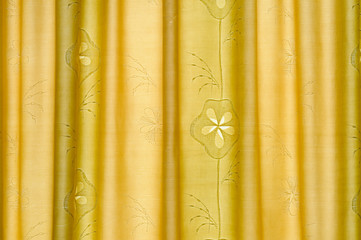 Gold color curtain texture to use as a background