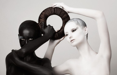 Women in Ying Yang Style. Occult Contrast Make-up. Unity