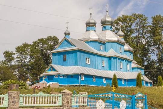 Blue wooden Orthodox church - Ukraine.