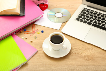 Cup of coffee on office desktop close-up