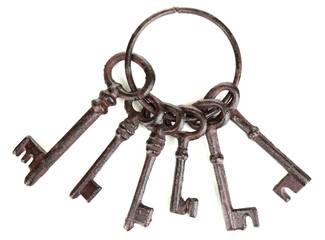 Bunch of old keys isolated on white