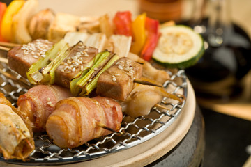 meat and vegetables on the grill