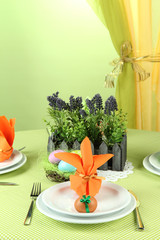 Easter table setting on color background