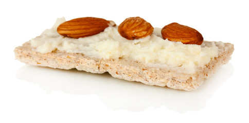 Crispbread with milk cheese and almond, isolated on white