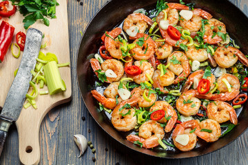 Freshly fried shrimps served on pan