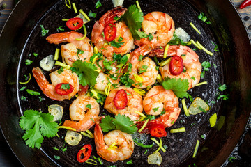 Closeup of shrimps fried on pan