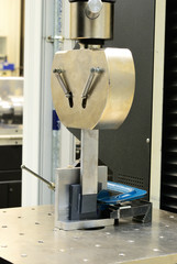 Testing a shear stress specimen on a tensile testing machine