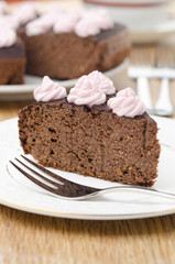 piece of chocolate cake with nuts closeup