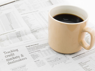 Morning coffee on a morning paper business news
