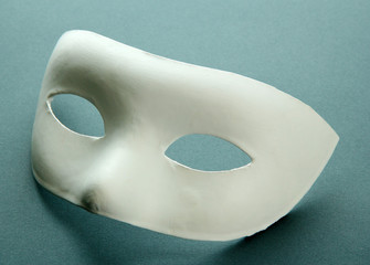 White mask, on grey background