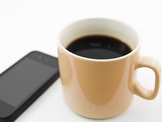 Morning coffee with mobile