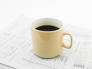Morning coffee on a morning paper business news