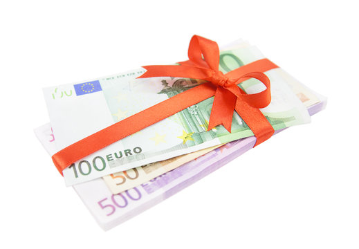 The euro money pile bound with a satin red ribbon and bow