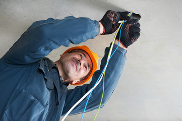 Electrician at wiring work