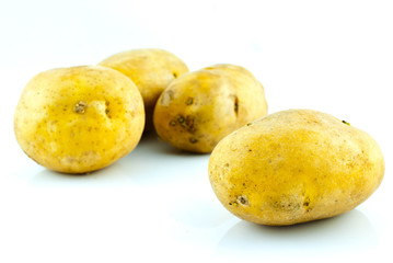 New potato isolated on white background close up