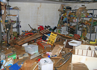 bicycle parts tool and  boxes inside the garage after the flood
