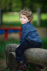 little boy on summer playground