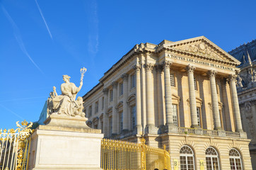 Statue and facade of the Palace of Versailles, France