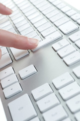  female hands touching computer keyboard