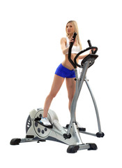 Pretty blonde woman on exerciser