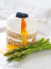 Bread with poached egg with asparagus