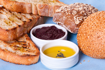 Arrangement of bread with sauces.