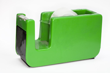 The  used of tape dispenser on white background.