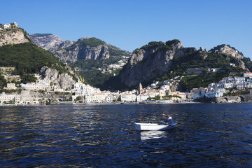 Fototapeta premium Buildings at the waterfront, Amalfi, Province Of Salerno, Gulf Of Salerno, Tyrrhenian Sea, Campania, Italy
