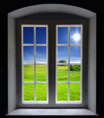 Window and summer landscape