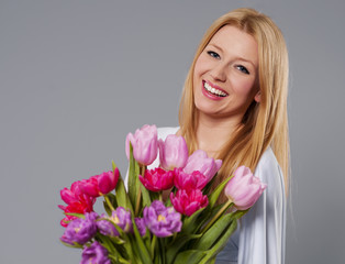 Young woman with spring flower