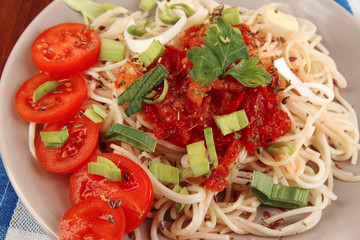 Tasty spaghetti with sauce and vegetables