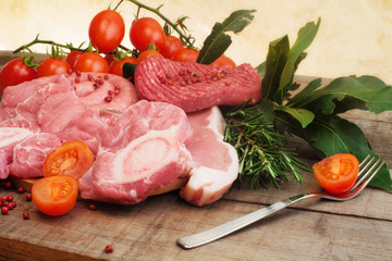 raw meat selection over rough wood