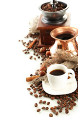 Cup and pot of coffee and coffee beans, isolated on white