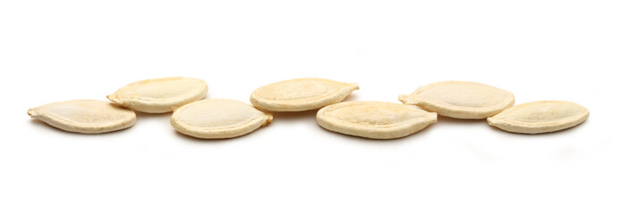 Pumpkin seeds on the white background