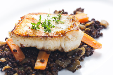 pikeperch fillet with lentils and carrot