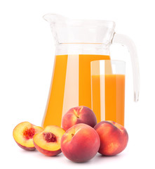 Peach fruit juice in glass jug