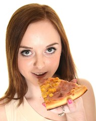 Young happy woman eating pizza