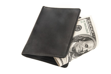 US dollars in a black wallet isolated on white