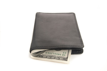 US dollars in a black wallet isolated on white