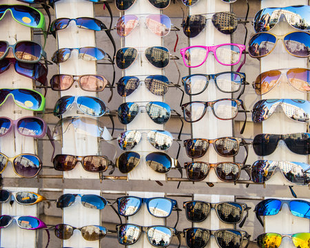 Many Sunglasses On Display In Shop